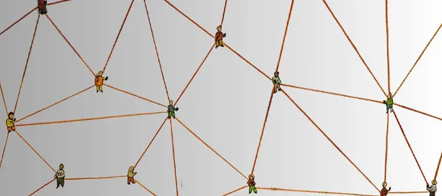 Several small cartoon representations of people are linked by brown handdrawn lines representing a network.